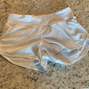 White Lululemon shorts with built in underwear, size 8 Tall
